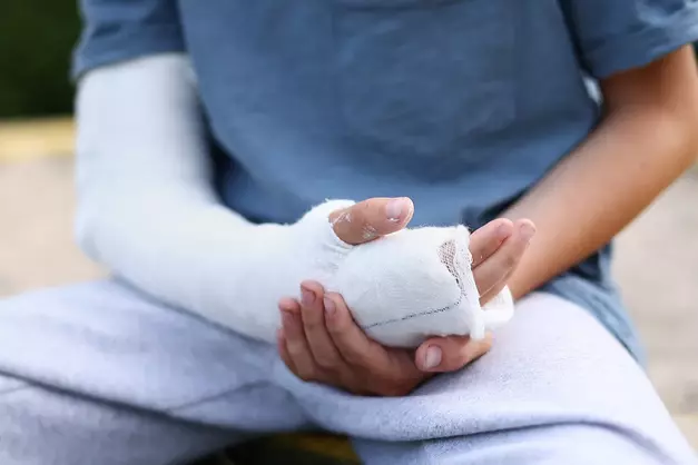 Person with their arm in a cast.