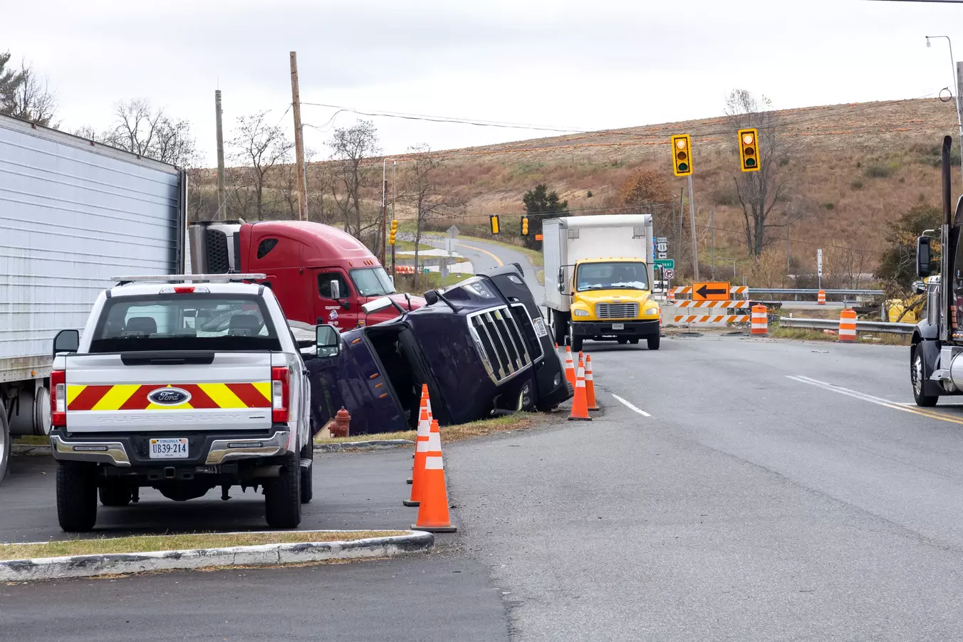 A commercial truck turned over in an accident.