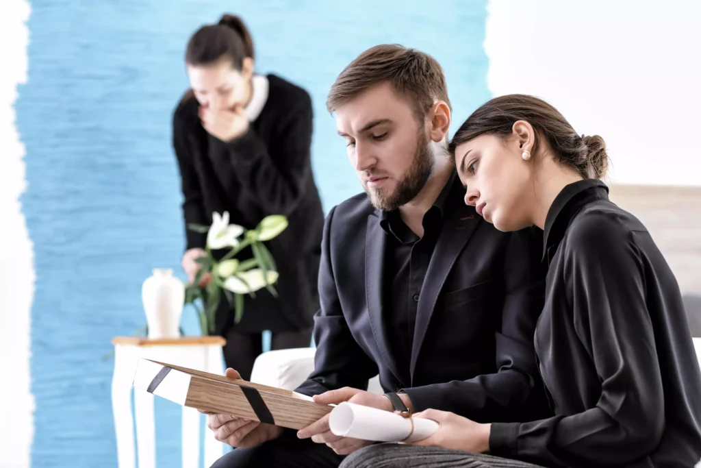 Mourning family dressed in black.