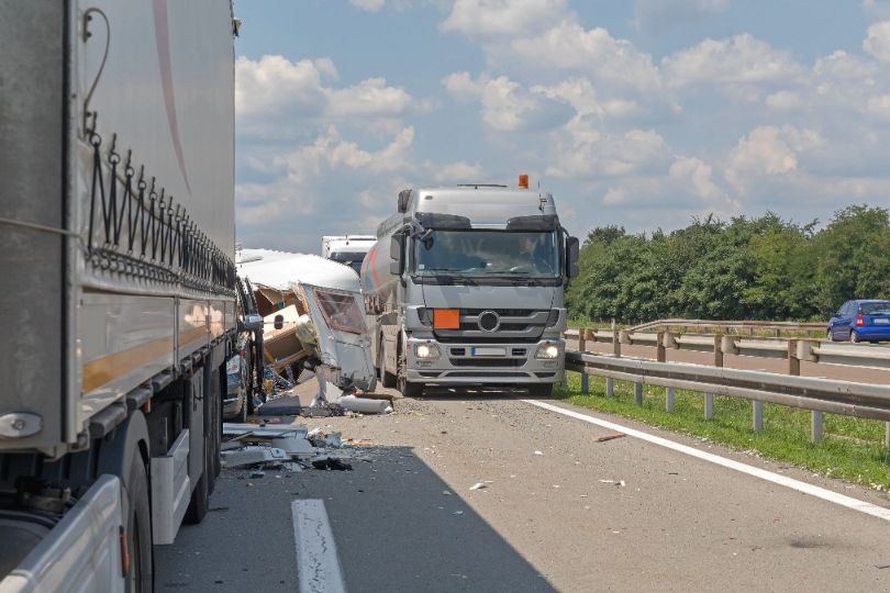 A commercial bus accident on the highway.