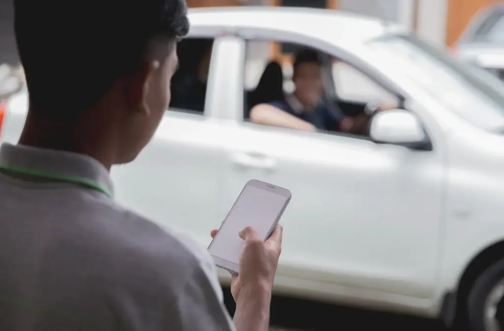 Someone waiting for an uber ride.